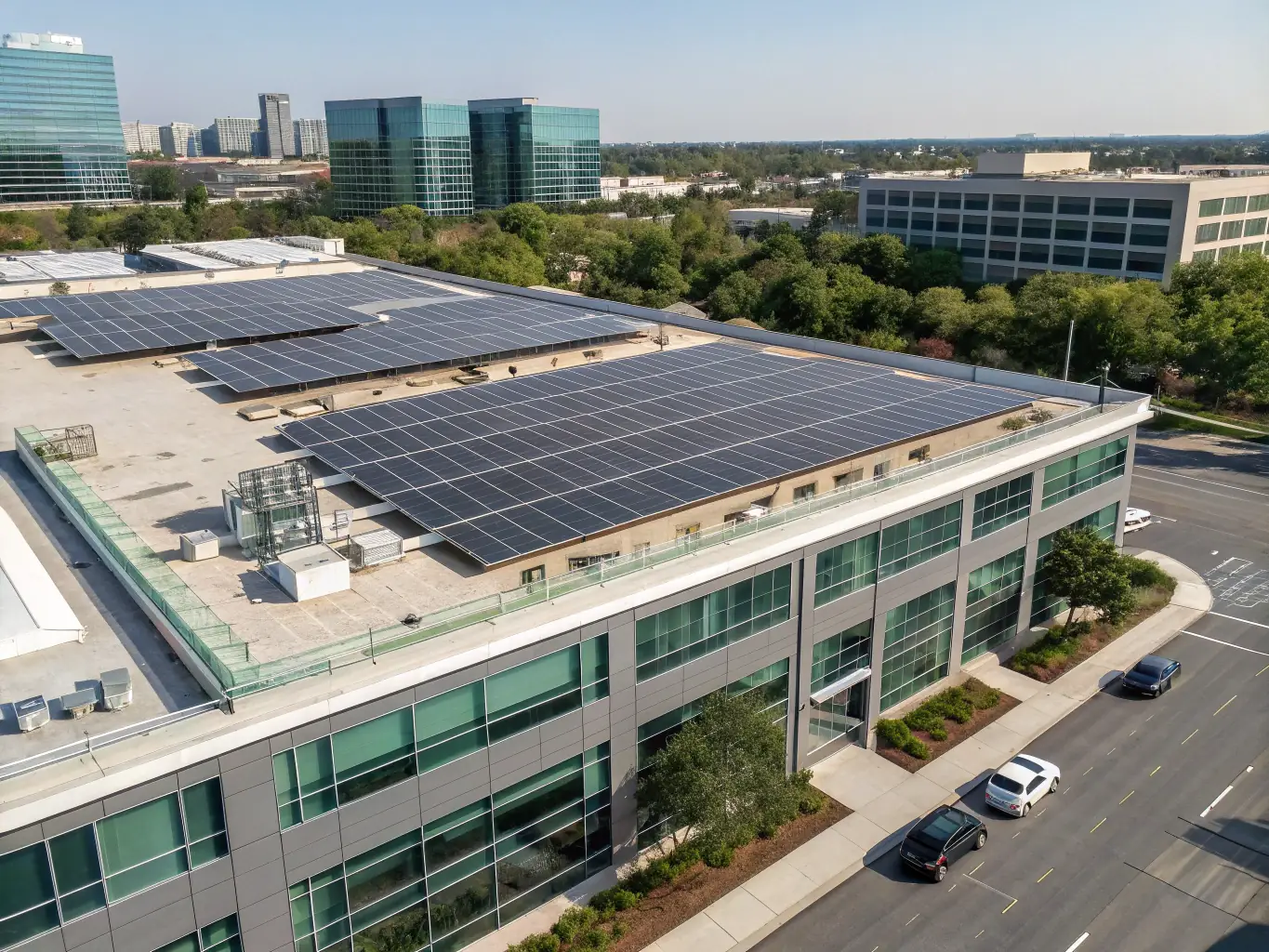 A solar panel array installed on a commercial building with a clear sky background, representing REGIONTEL & CelinTech's sustainable energy solutions.